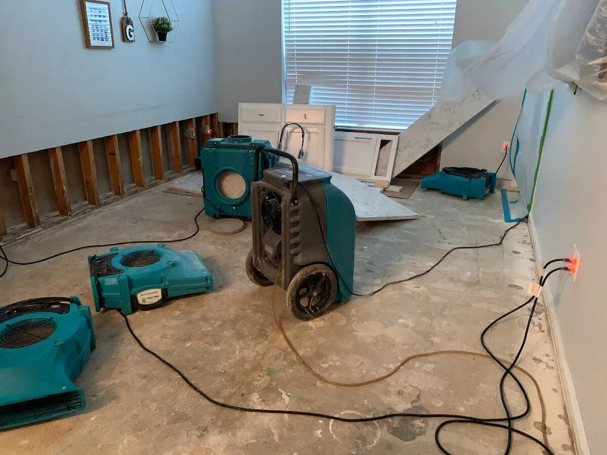 Dehumidifier in flood-cut room for Water Damage Restoration in Camden